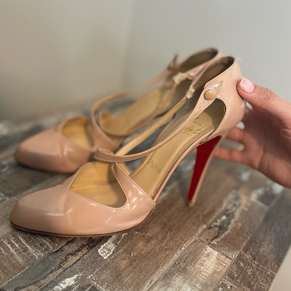 Christian Louboutin‘s very good shape but too high of a heel for me.